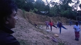 The villages of Koradekumbura doing physical exercises in the village playground.